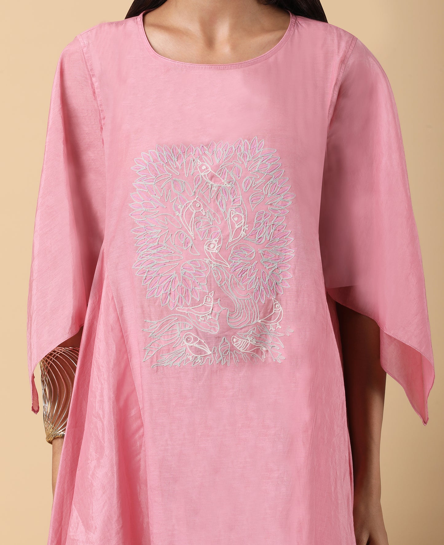 Asymmetric coordinate tunic