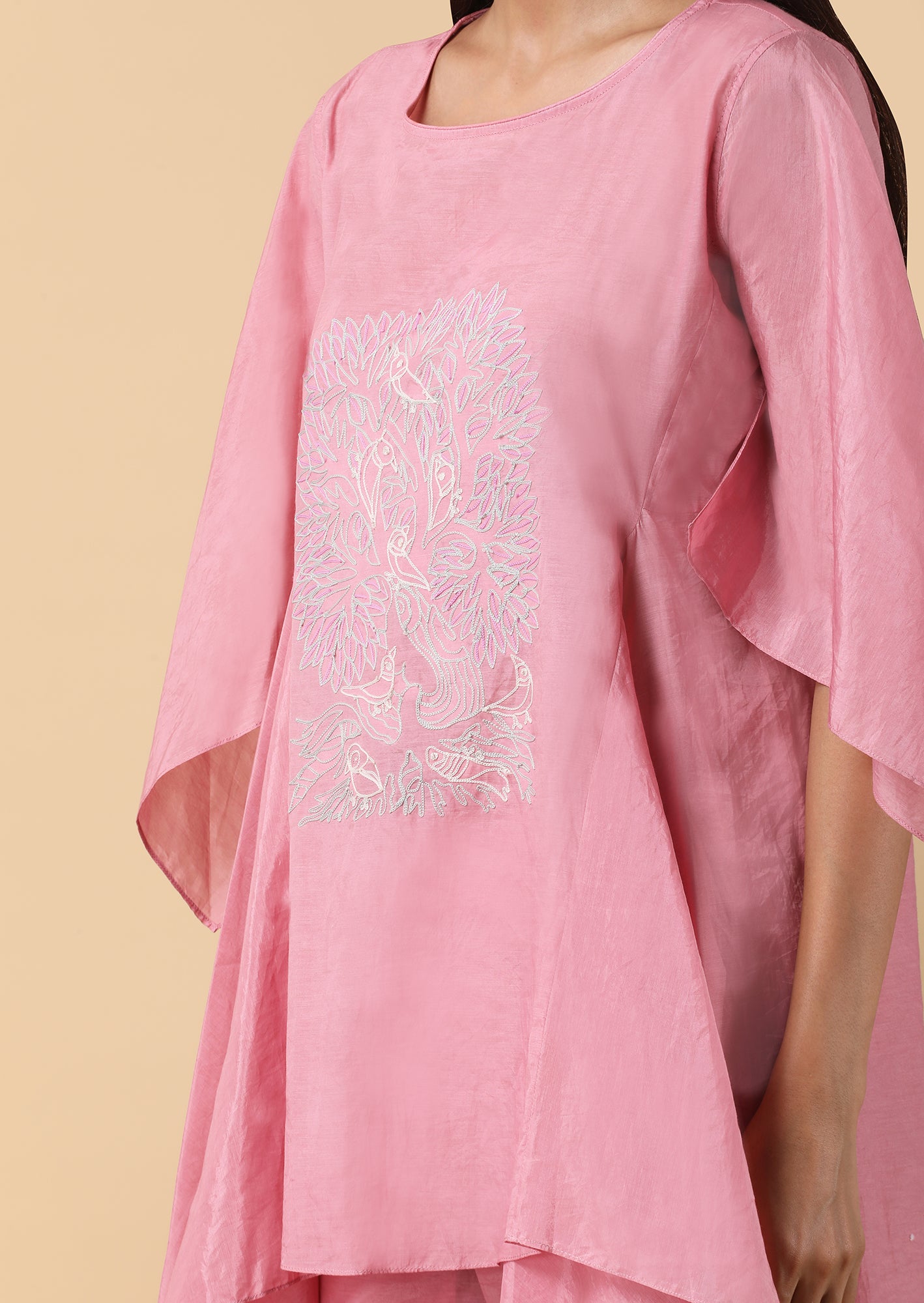 Asymmetric coordinate tunic