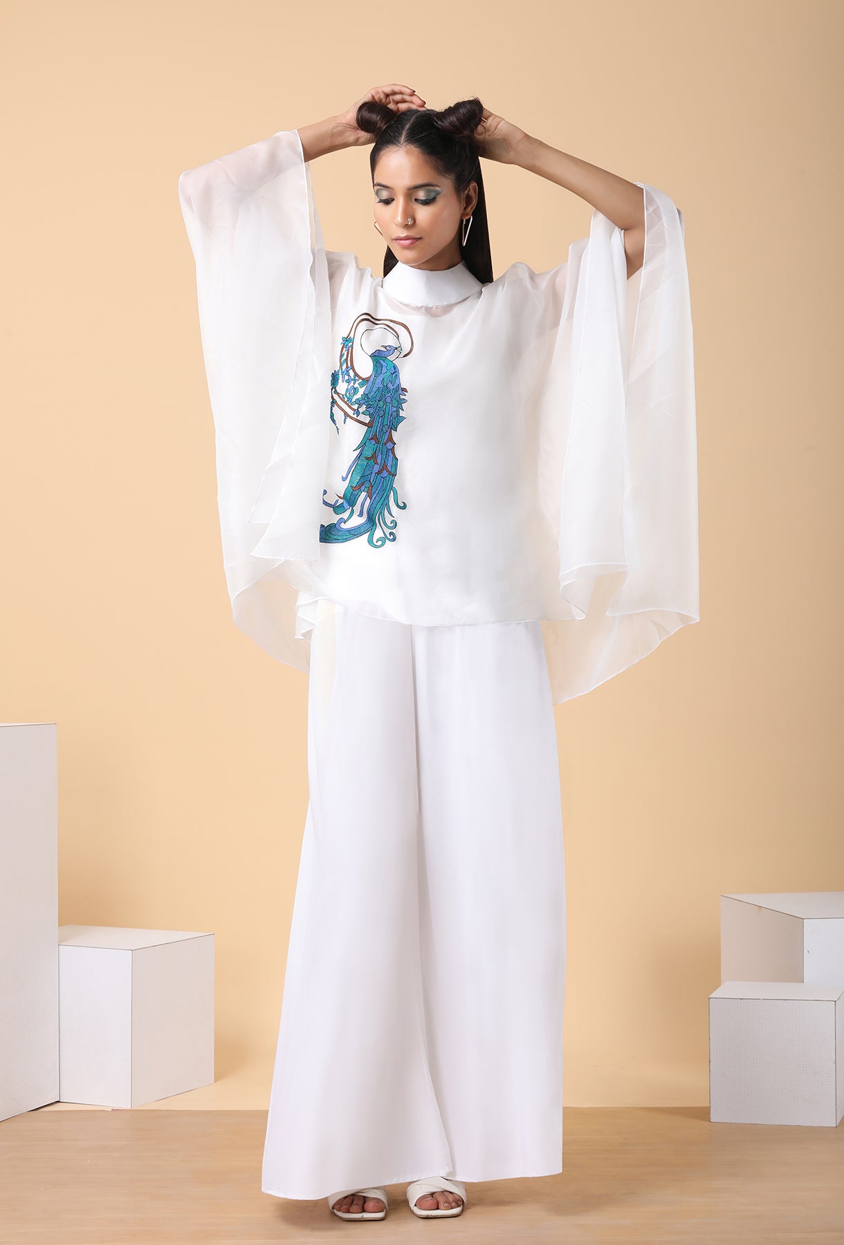 Batwing sleeves white top