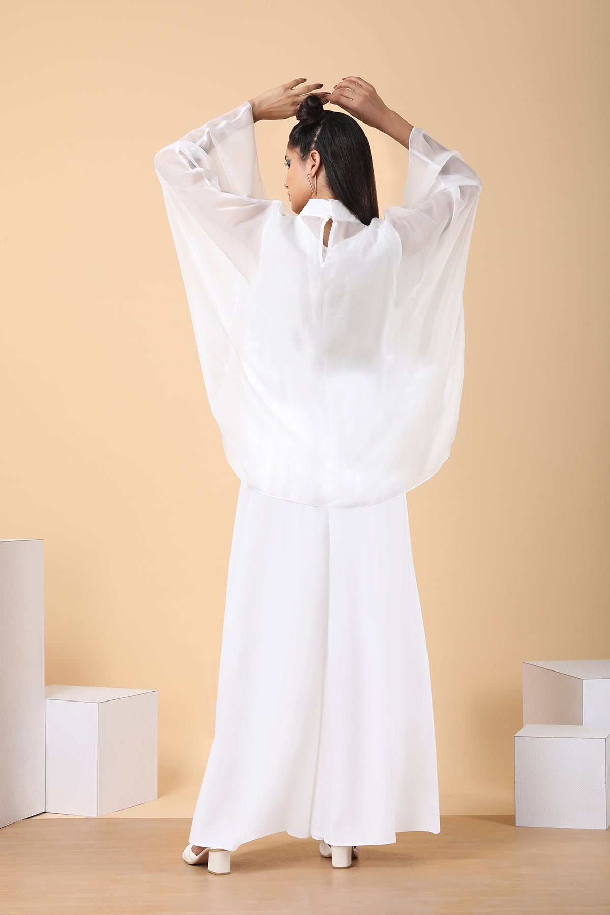 Batwing sleeves white top